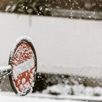  Stop sign with snow on it.